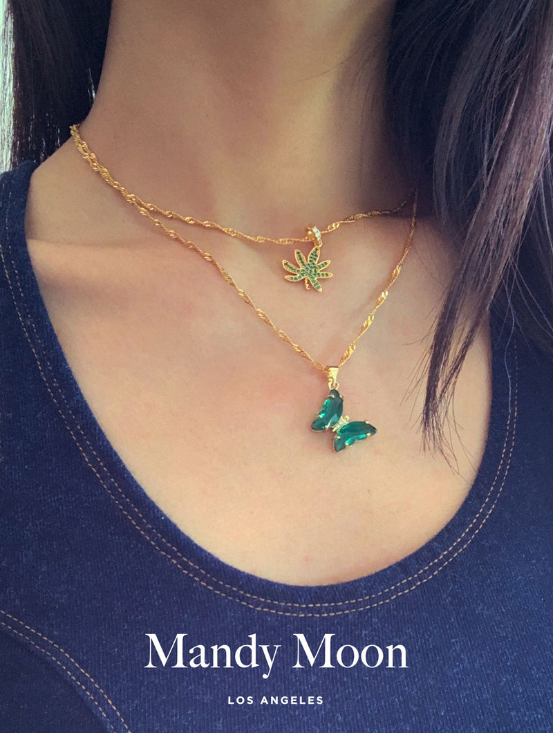 Green Glitter Butterfly Charm Necklace (Golden) at Rs 52/piece | Charm  Necklace in New Delhi | ID: 2849751956848